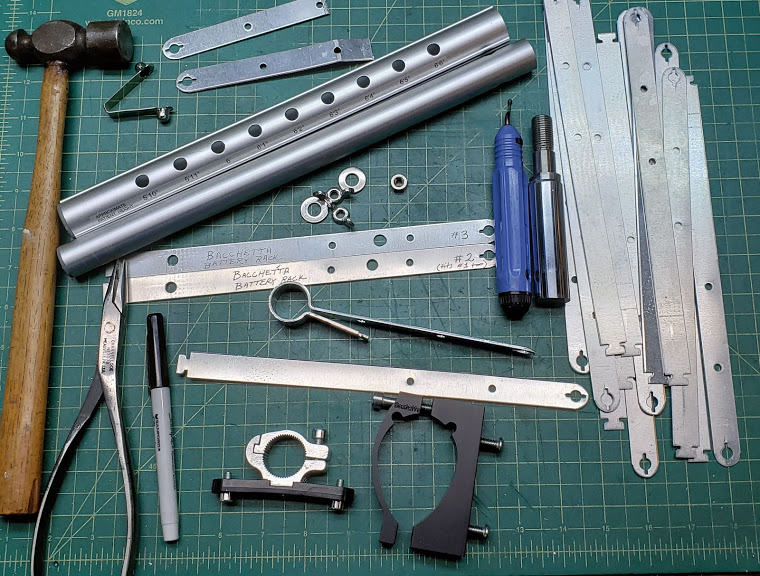 eg20_diy_battery_rail_and_frame_clamps_on_workbench_photo