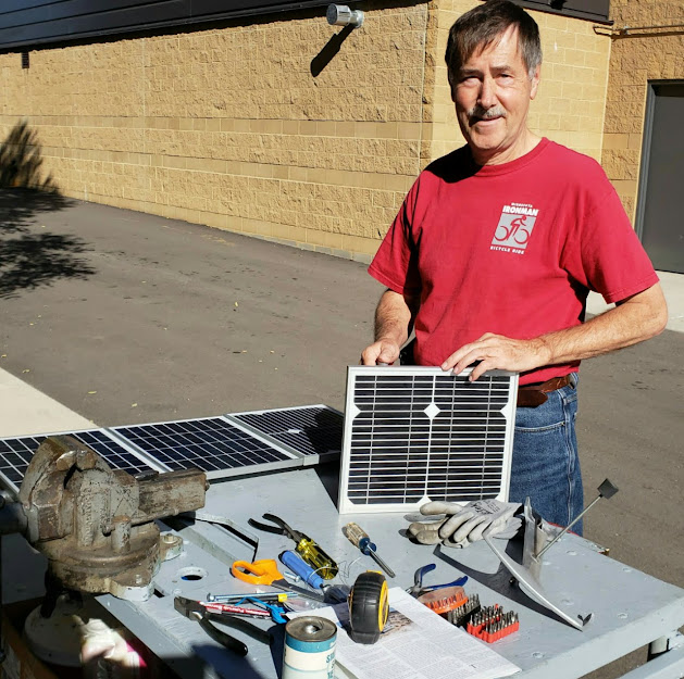 solar_panels_5x10w_assembly_on_workbench_outdoors_photo