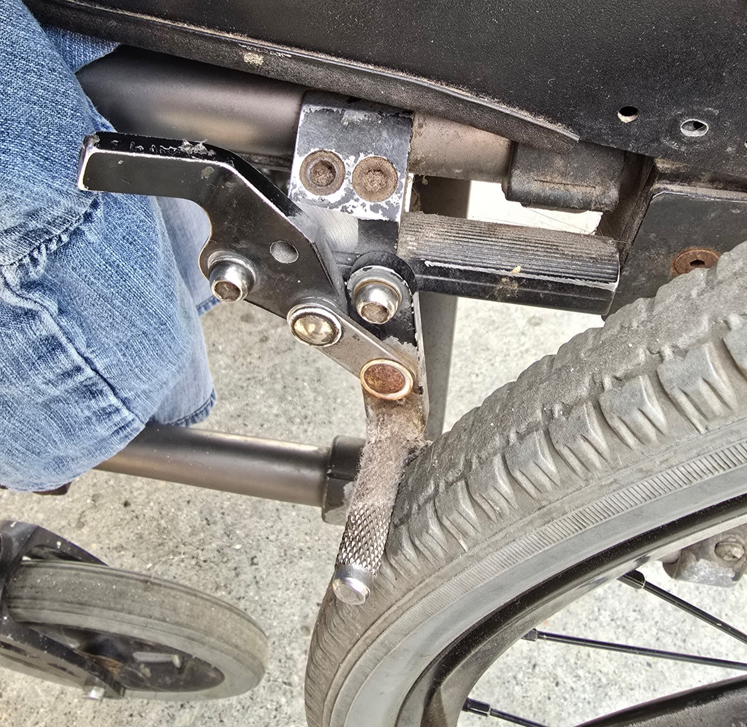 permobility_tilite_titanium_2008_wheelchair_brake_left_installed_old_photo
