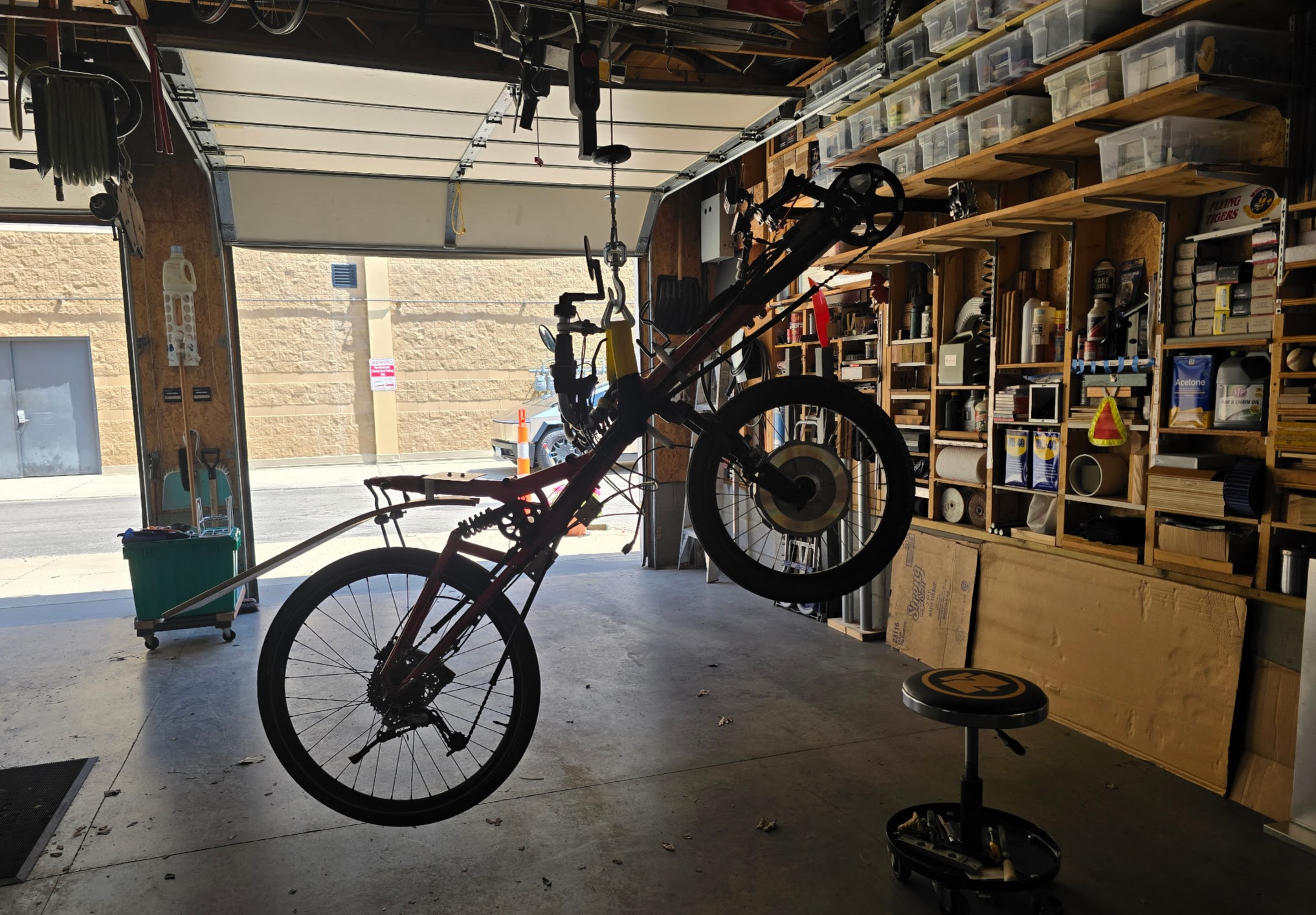 streetmachine_stella_suspended_from_electric_hoist_in_garage_photo